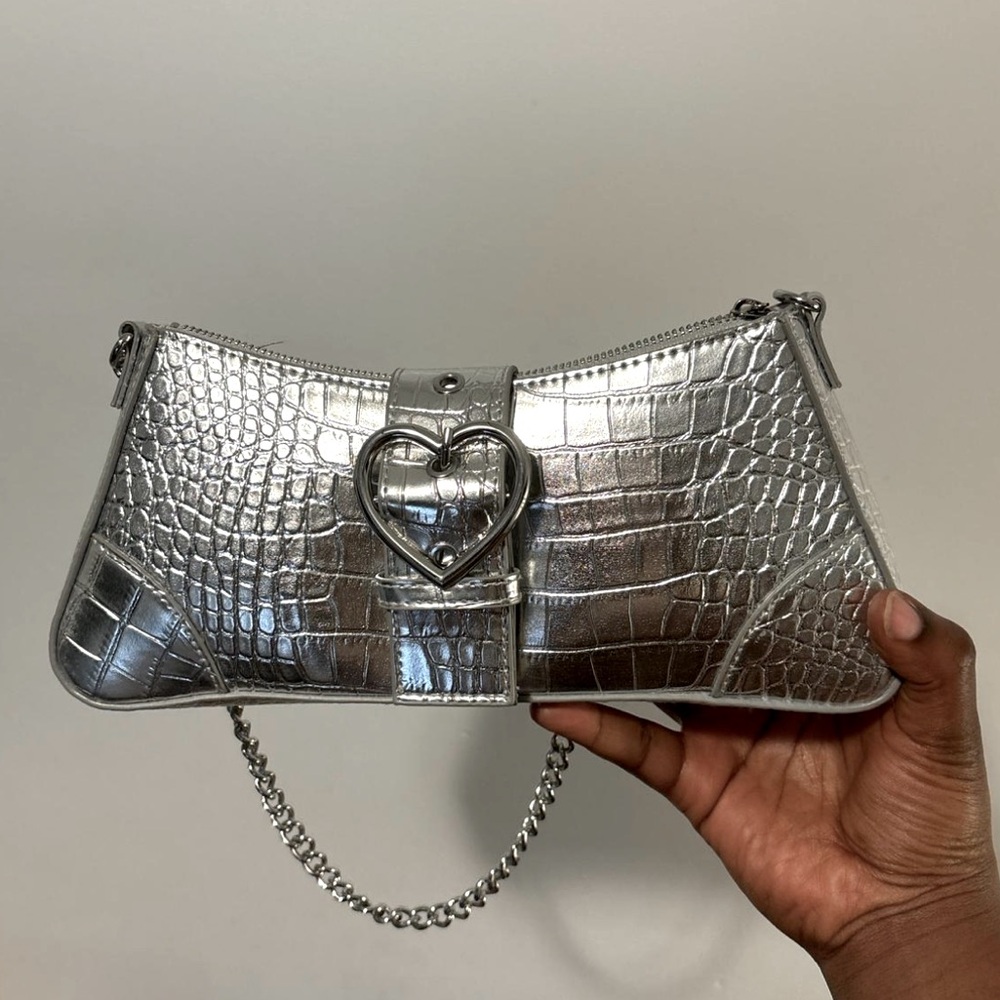 Silver heart clutch bag with long chain